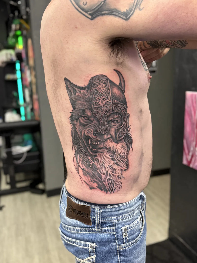 Viking Wolf Rib Tattoo