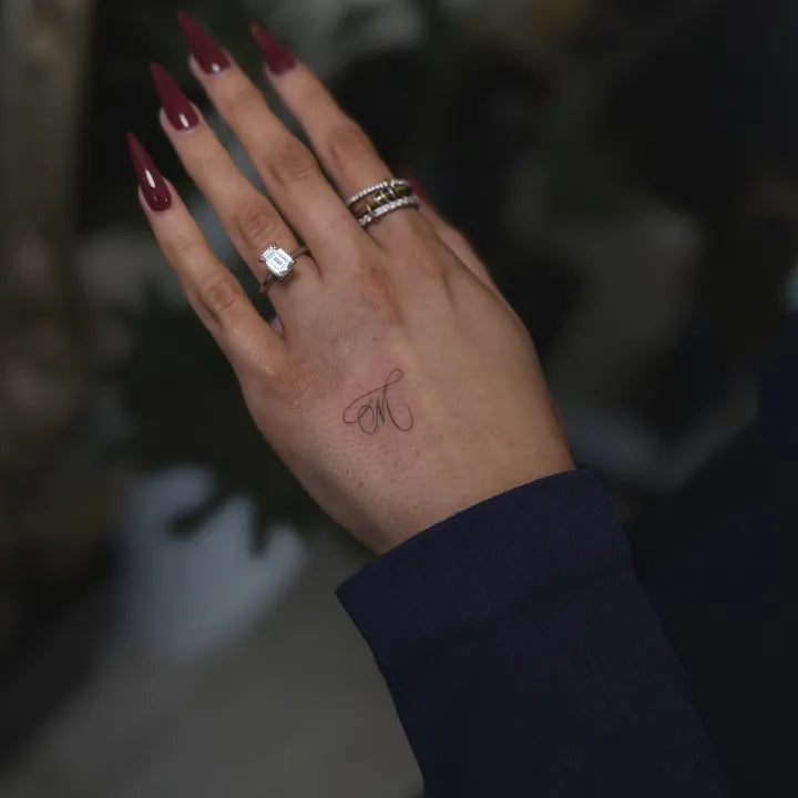 Minimalist Initial Hand Tattoo