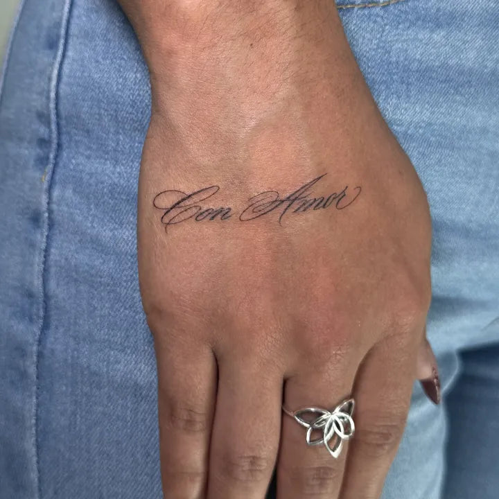 Cursive Script Hand Tattoo