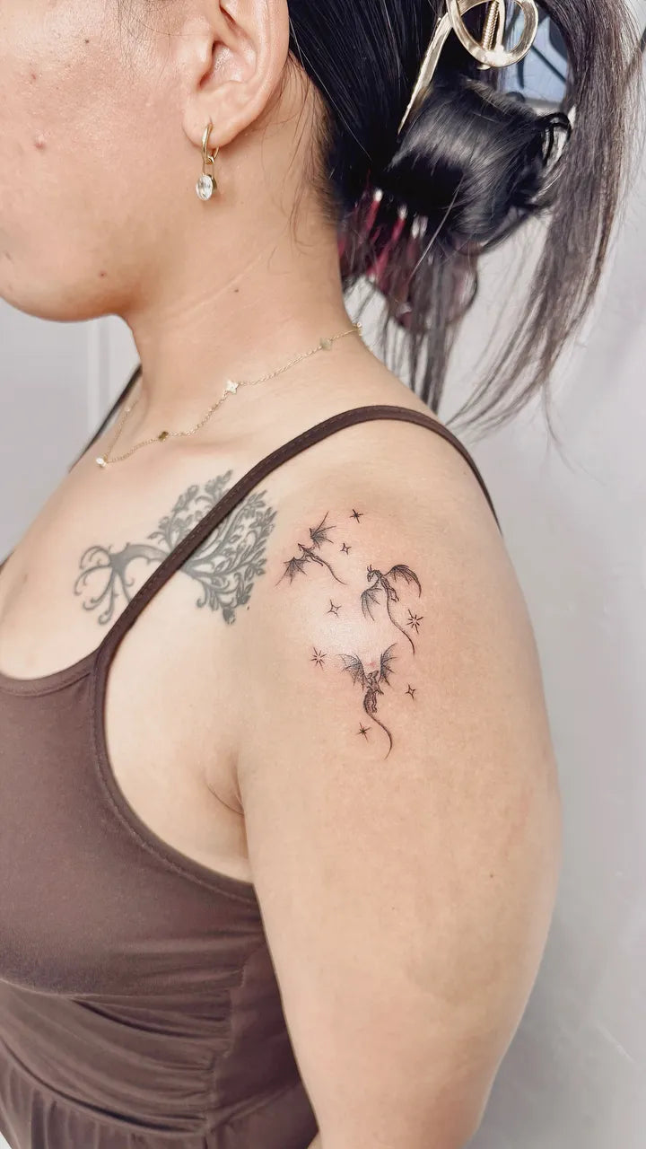 Dragon Stars Shoulder Tattoo