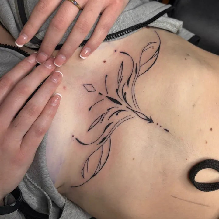 Minimal Floral Sternum Tattoo
