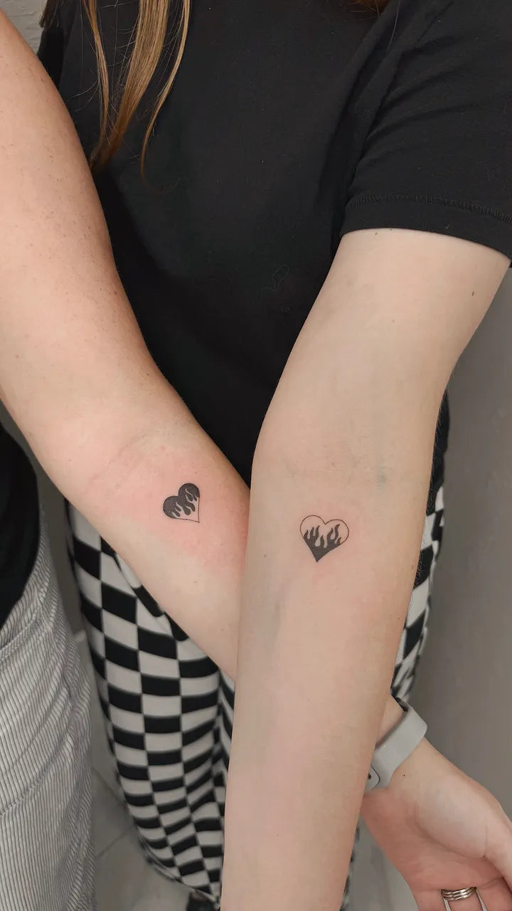 Matching Flame Heart Tattoos