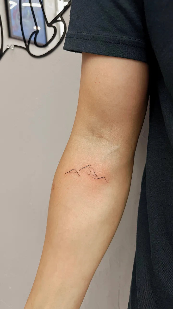 Minimalist Mountain Line Tattoo