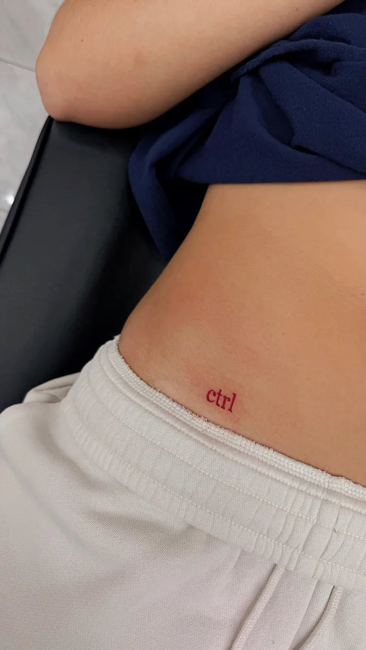 Red Ctrl Text Hip Tattoo
