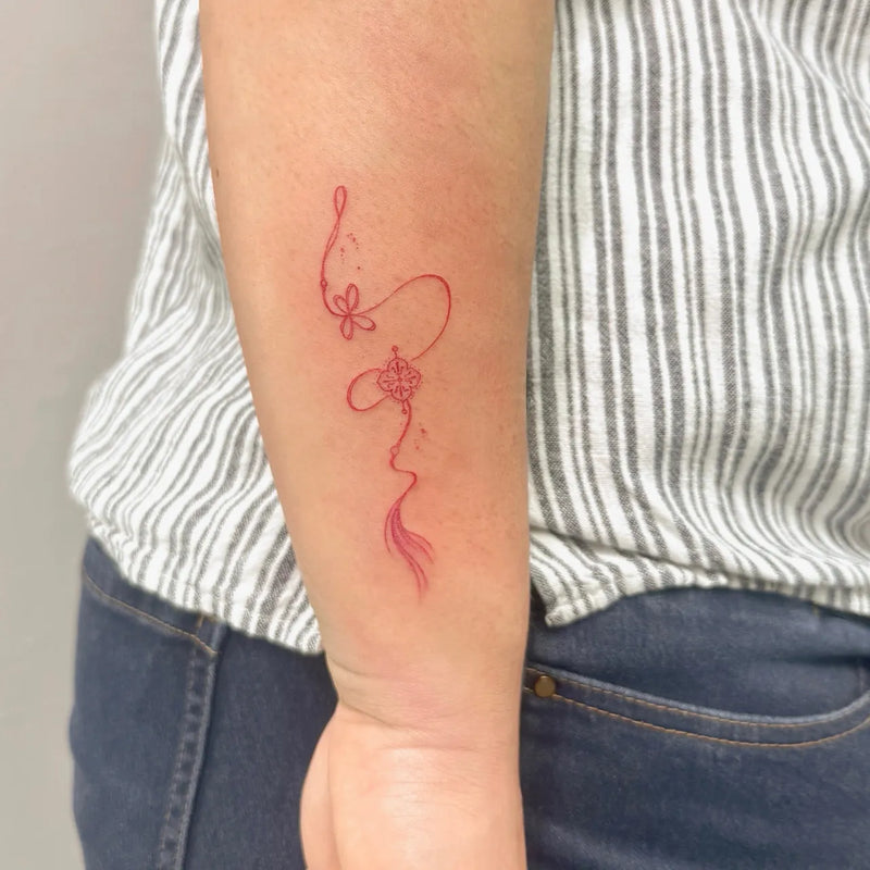 Red Ornamental String Fine Line Tattoo
